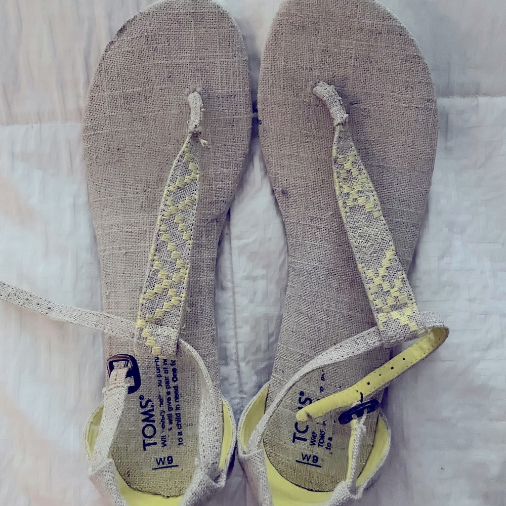 Tom’s cream and neon yellow sandals